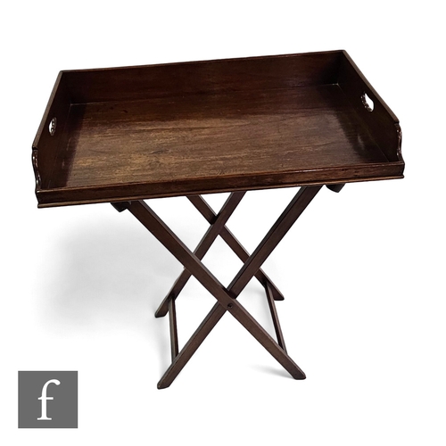 718 - A George III mahogany butler's tray on folding stand, width 76cm.PLEASE VIEW CONDITION REPORT... 