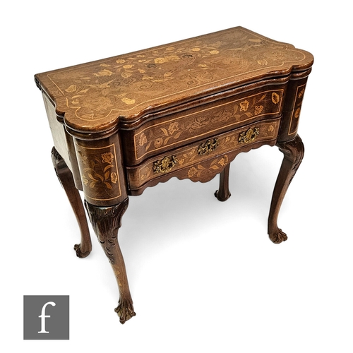 683 - An 18th Century Dutch marquetry inlaid fold over card table, the top detailed centred with an urn fl... 