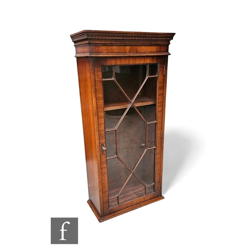 726 - A small George III style mahogany wall cupboard enclosed by an astragal glazed door, height 103cm x ... 