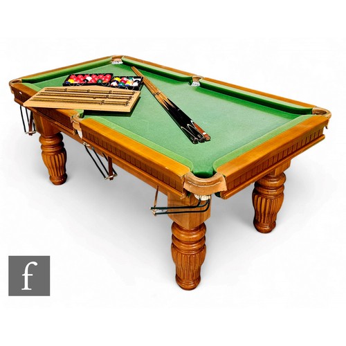 728 - A 20th Century 'Riley' style slate bed quarter size billiard table, green baize and wooden frame, on... 