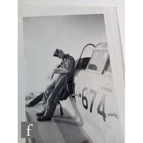 585 - Four aerobatics pilot's flight books belonging to Captain Robert M Veenhuysen, circa 1960, with a Ca... 