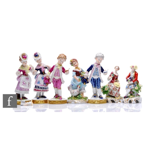 1134 - A collection of 20th Century continental hard paste porcelain figures modelled as figures in period ... 