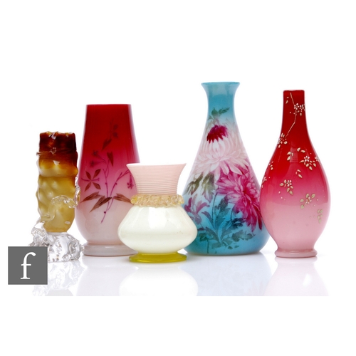 194 - A Harrach Peachblow art glass vase, of tapered footed form painted with orchid sprays on graduated p... 