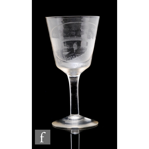 196 - A 20th Century Sunderland Bridge engraved wine glass, bucket shaped bowl on clear stem and circular ... 