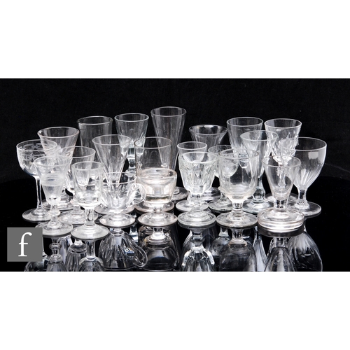 303 - A collection of assorted 19th Century drinking glasses to include petal moulded, engraved and cut ex... 