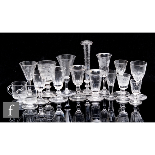 305 - A collection of late 18th and 19th Century drinking glasses and stem ware to include moulded, cut, e... 