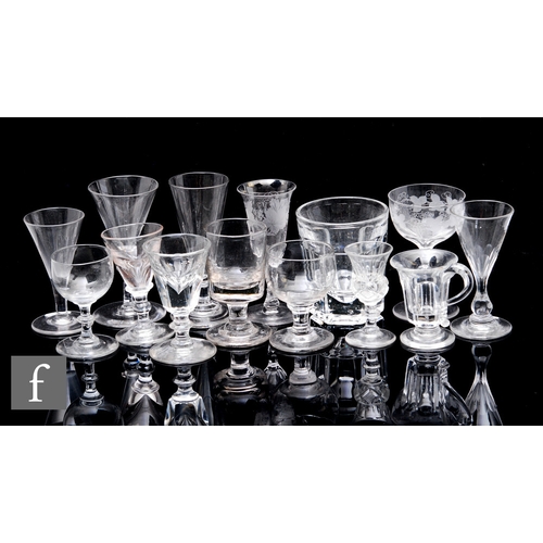 307 - A collection of late 18th and 19th Century drinking glasses and stem ware to include moulded, cut an... 