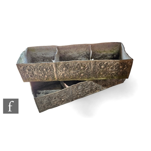 734 - A large pair of rectangular lead troughs in the Renaissance style each with two internal divisions, ... 