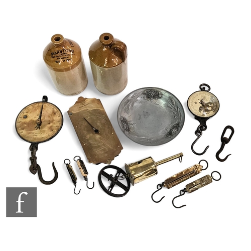 553 - A large set of brass Salters scales and similar circular set of scales, similar smaller scales, a  r... 