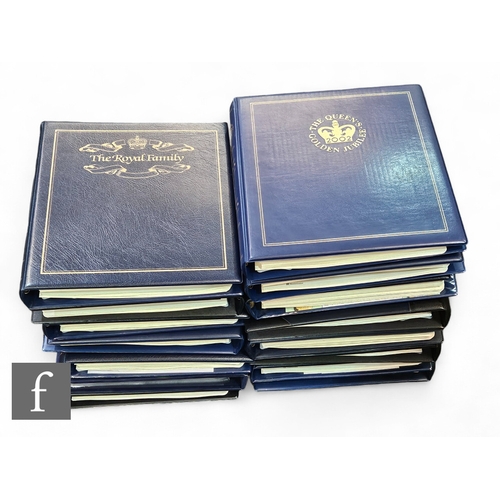 580 - A collection of fifteen albums of coin inset royal first day covers. (15)PLEASE VIEW CONDITION REPOR... 