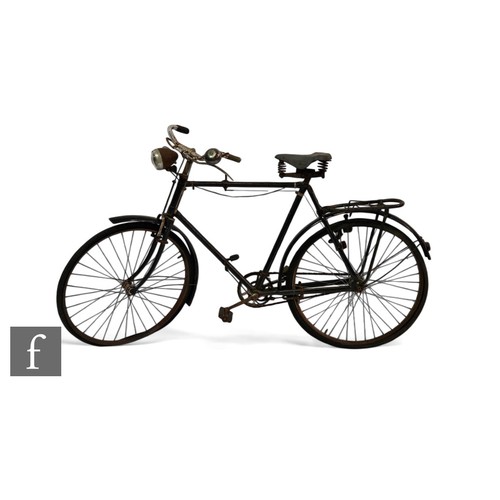 555 - A 1940s/50s Triumph bicycle, with Sturmey Archer gears, Dunlop seat, 25.5 inch wheels, split rubber ... 