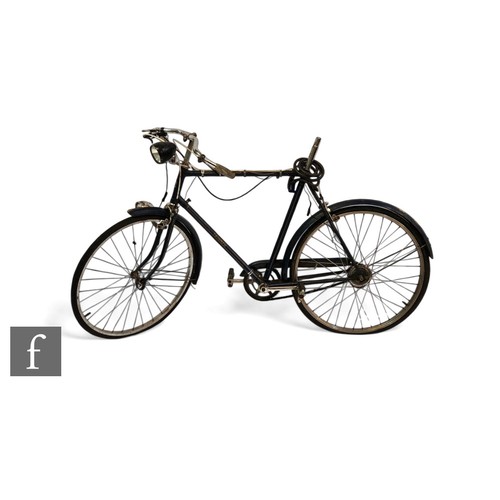 557 - A 1960s/70s Triumph bicycle, with 24 inch wheels, split rubber pedals and 8 inch chain wheel, dark b... 