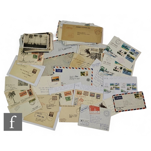 613 - A collection of forty three postal covers and over eight postcards relating to Samoa, some real phot... 