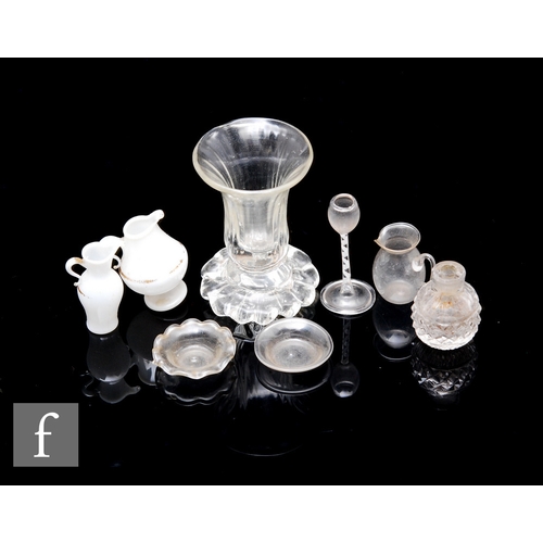 309 - A small collection of late 18th and 19th Century glass miniatures to include a custard cup with flut... 