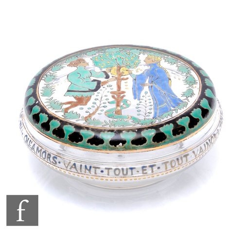 272 - A late 19th Century French enamelled box and cover of circular form, the lid decorated with a scene ... 