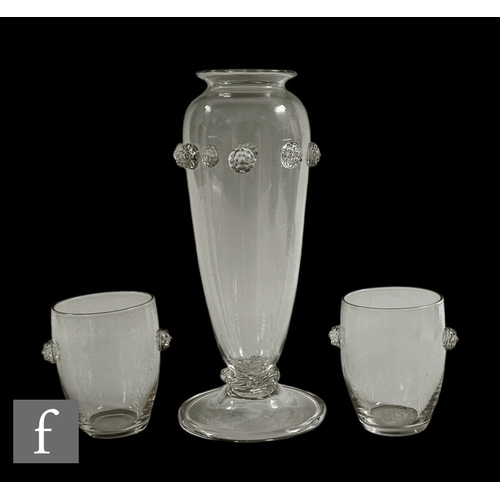 274 - A late 19th Century clear glass vase of elongated ovoid footed form, with strawberry prunt band, wit... 