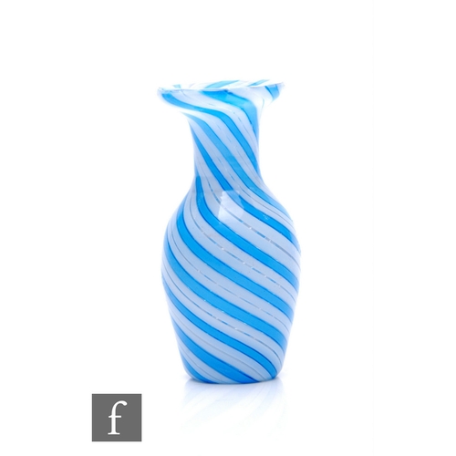 294 - A 20th Century Clichy miniature glass vase of baluster form, internally decorated with spiral blue a... 