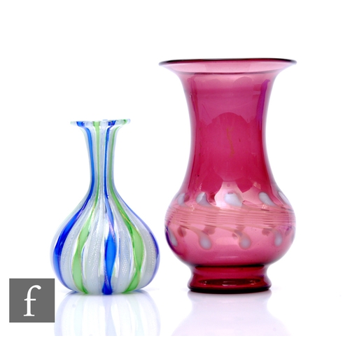 301 - An Italian Murano Zanfirico aventurine and ribbon filigree glass vase, of bottle form with flared ri... 