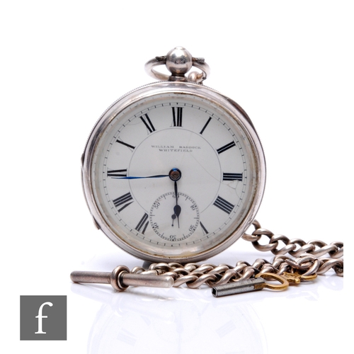 304 - A hallmarked silver open faced key wind pocket watch, suspended from a graduated Albert chain, weigh... 