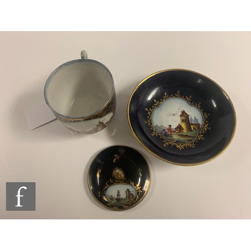 34 - A late 19th Century porcelain chocolate cup, cover and saucer decorated with hand painted cartouche ... 