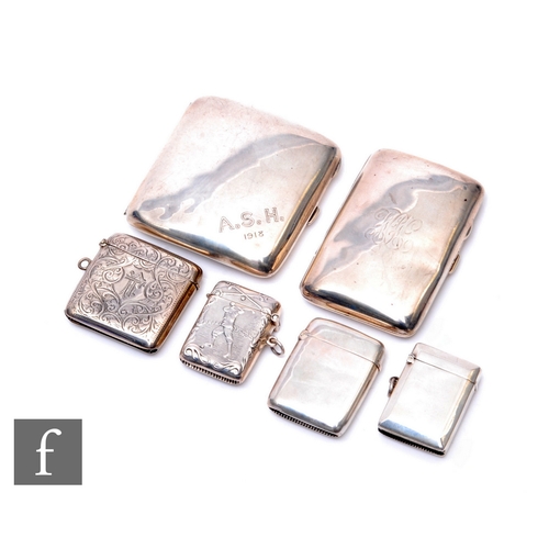 26 - Two hallmarked silver cigarette cases with three hallmarked silver vesta cases and a modern 925 exam... 