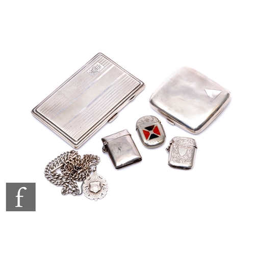 59 - A small parcel lot of hallmarked silver to included two cigarette cases, a vesta case etc, weight of... 