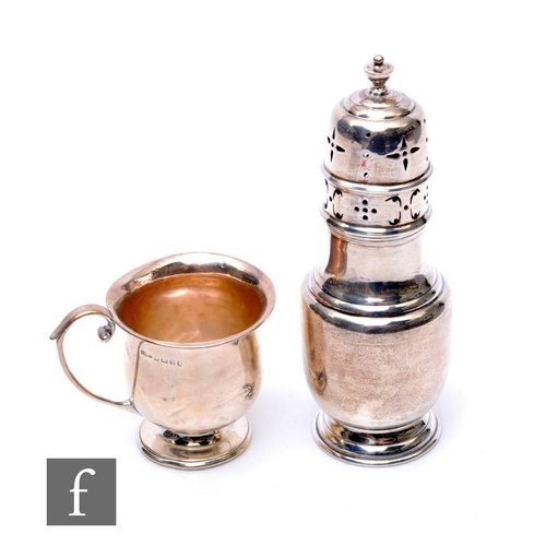 64 - A hallmarked silver sugar castor with a silver christening cup, total weight 7oz, Birmingham 1921 an... 