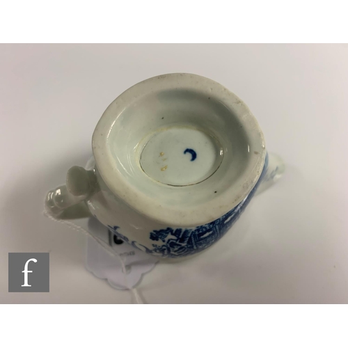 88 - A Worcester blue and white fisherman pattern sauce boat, circa 1780, printed decoration over white g... 