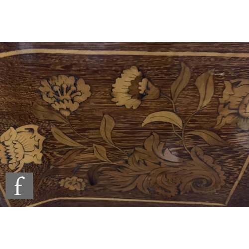 683 - An 18th Century Dutch marquetry inlaid fold over card table, the top detailed centred with an urn fl... 