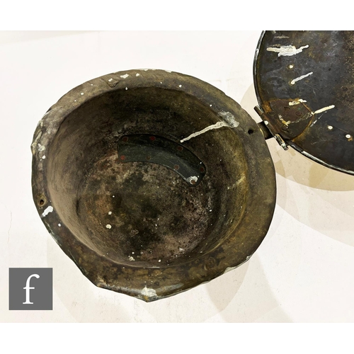 479 - A 17th Century brass warming pan, the domed centre engraved with scroll and leaf design and the oute... 