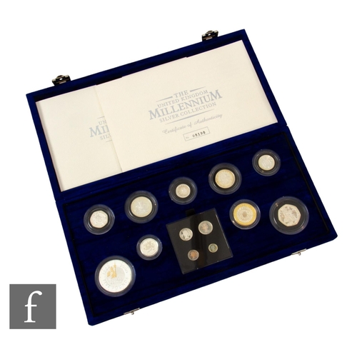 88 - Elizabeth II - A Royal Mint The Millennium silver collection of thirteen coins with certificate, cas... 