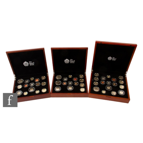 92 - Elizabeth II - Three Royal Mint United Kingdom Premium Proof coin sets, 2014, 2015 and 2016, all in ... 