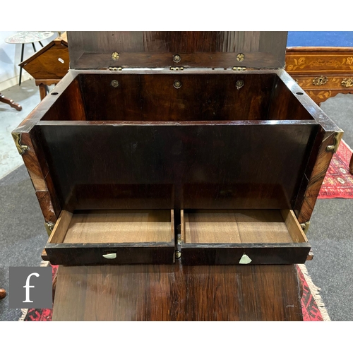 682 - A late 18th to early 19th Century two handled rosewood chest on stand, fitted interior with hinged f... 