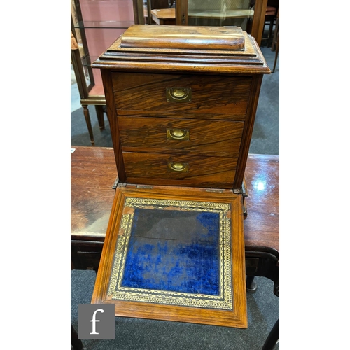 747 - A Victorian figured walnut table cabinet fitted with three drawers, recessed brass handles, enclosed... 