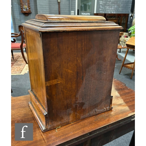 747 - A Victorian figured walnut table cabinet fitted with three drawers, recessed brass handles, enclosed... 