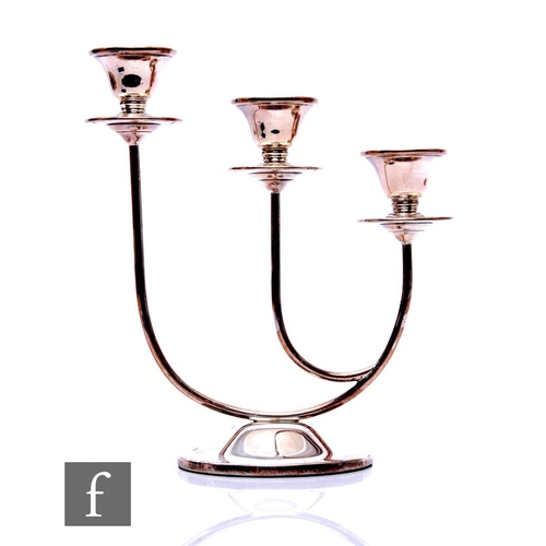 74 - A modern hallmarked silver three light candelabra, circular base below stepped circular sconces, hei... 