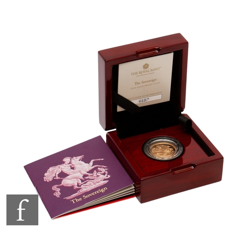 400 - Charles III - A 2024 proof sovereign with certificate no 6187, in mahogany finish case with outer ca... 