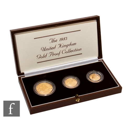 402 - Elizabeth II - A 1983 half sovereign to two pound three coin set, with certificate, cased.