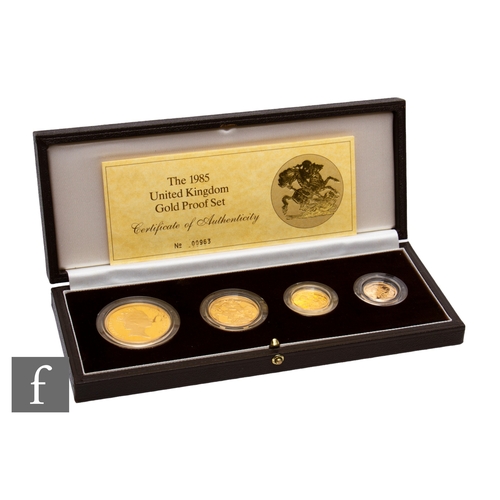 404 - Elizabeth II - A 1985 half sovereign to five pound, four coin set, with certificate, cased.