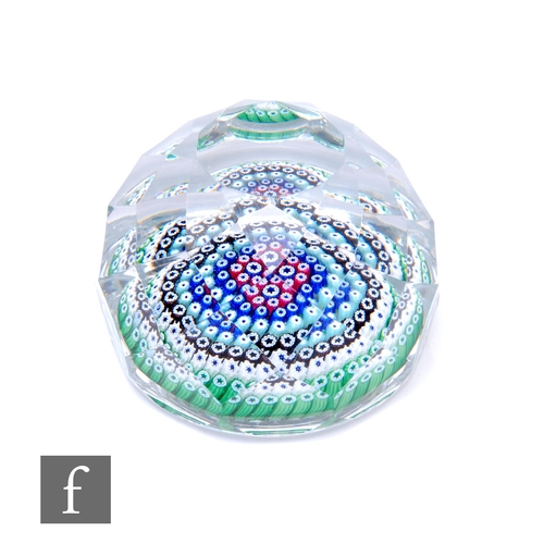 464 - A later 20th Century Whitefriars glass paperweight, internally decorated with six concentric circles... 