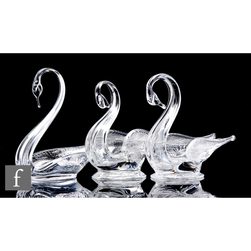 220 - A Webb Corbett clear glass swan form dish, with original label, height 18cm, together with two simil... 