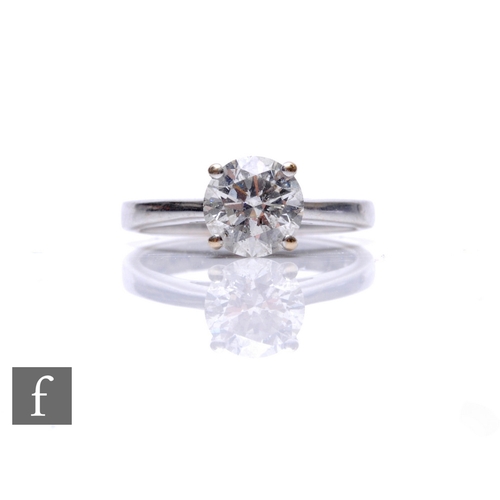 266 - An 18ct white gold diamond solitaire ring, four claw set brilliant cut stones, weight approximately ... 