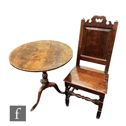 606 - A George III circular oak tripod occasional table on turned baluster pedestal on splayed legs and a ... 