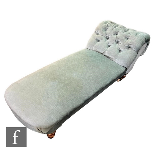 638 - A Victorian chaise longue on turned legs, upholstered in pale blue buttoned pink plush, length 174cm... 