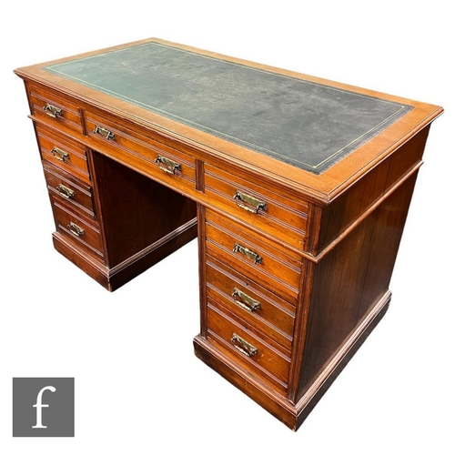 646 - A late Victorian mahogany pedestal kneehole desk, the leather inset top over three drawers and three... 