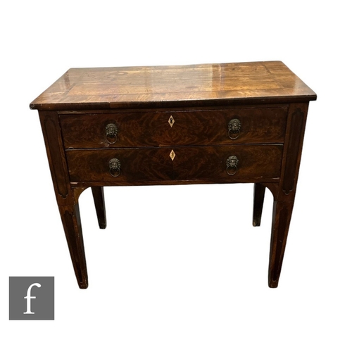 607 - A 19th Century writing table with two dummy drawers, fitted interior and slide below a crossbanded t... 