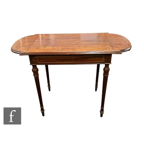 626 - An Edwardian line inlaid mahogany drop flap table, single drawer, the shaped top on turned fluted le... 