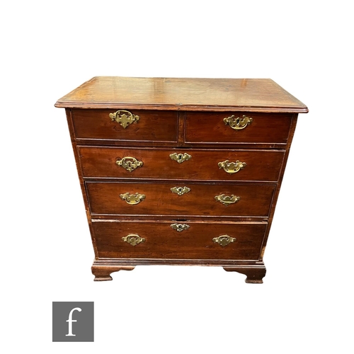 602 - A small George III mahogany straight front chest of two short and three long drawers, later brass fr... 