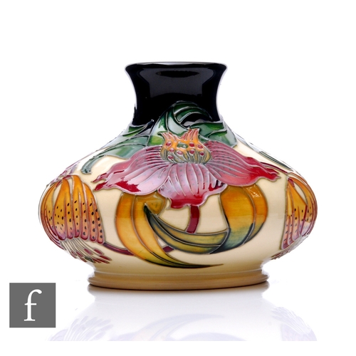 70 - Nicola Slaney - Moorcroft - An Anna Lily Vase, circa 1998, of compressed baluster form, tubeline dec... 