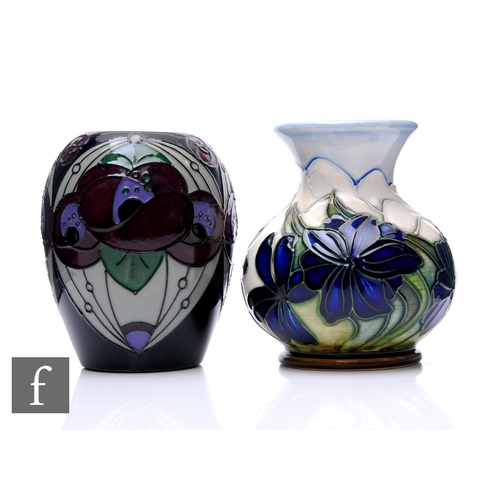 72 - Rachel Bishop - Moorcroft Pottery - A Rennie Rose pattern vase, circa 2013, tubeline decorated over ... 